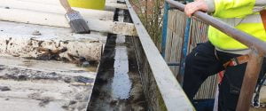 Medical Supplies Client Project | Construction worker near warehouse roof